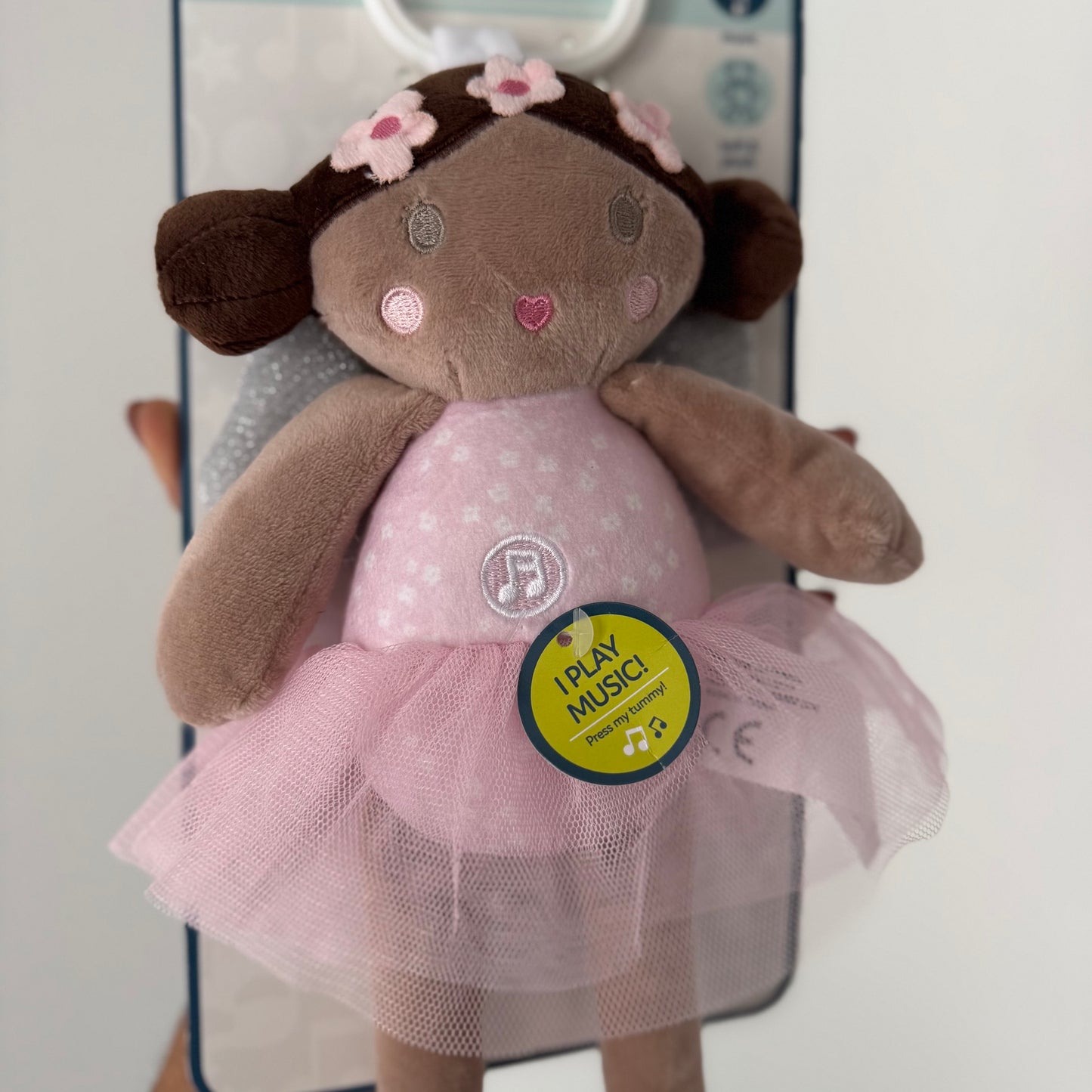 Muñeca musical con gancho
