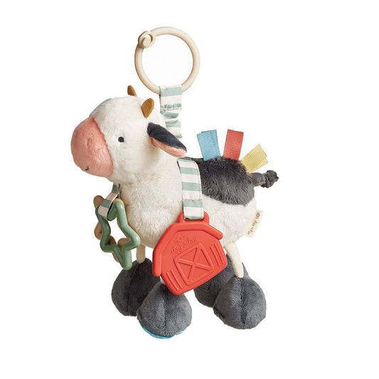 Peluche sensorial para viajar cowi