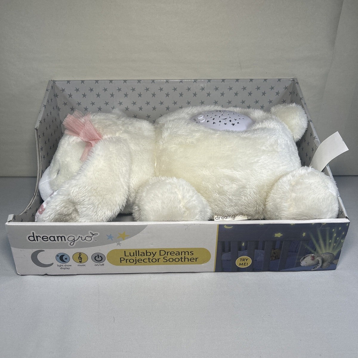 Peluche proyector de luz y sonido